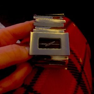 Nixon watch worn lightly, fancy watch that dresses up beautifully!